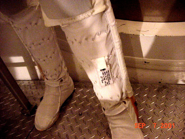 A badge was placed on the lower left leg in a pocket of the astronaut's liquid cooling garment