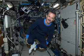 A photo of weightless Chris Hadfield in his new space pajamas