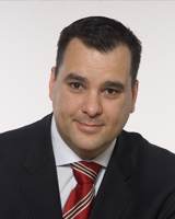 The Honourable James Moore, Minister of Industry