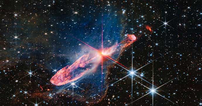 Image of a tightly bound pair of actively forming stars, known as Herbig-Haro 46/47