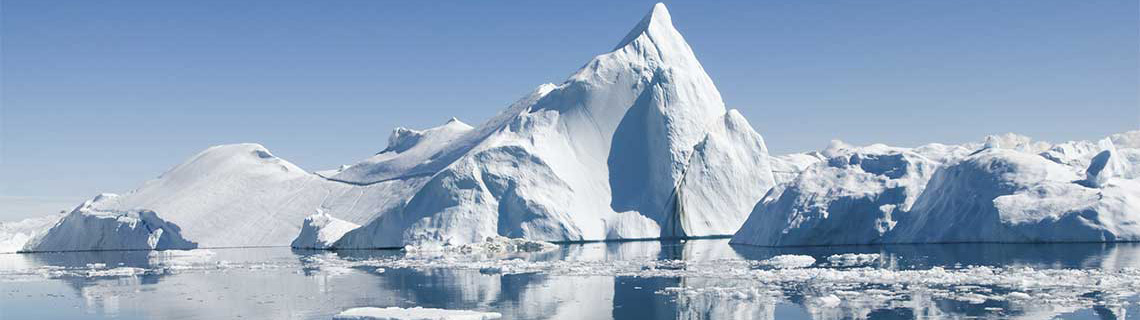 An iceberg and its reflection in the water