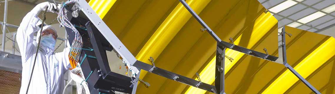 Technician working on the James Webb Space Telescope