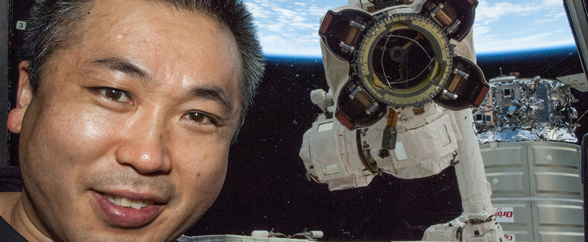 Koichi Wakata on the ISS with Canadarm2's Latching End Effector in the background