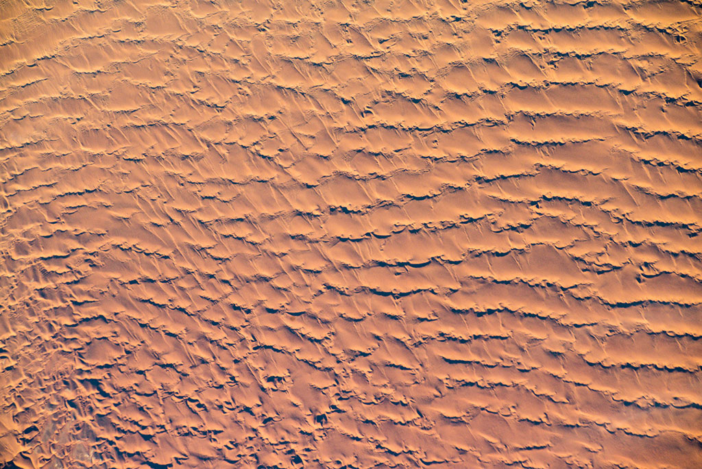 Sand dunes seen from the International Space Station while traveling over southwest Africa. (Credit: Alexander Gerst/European Space Agency)