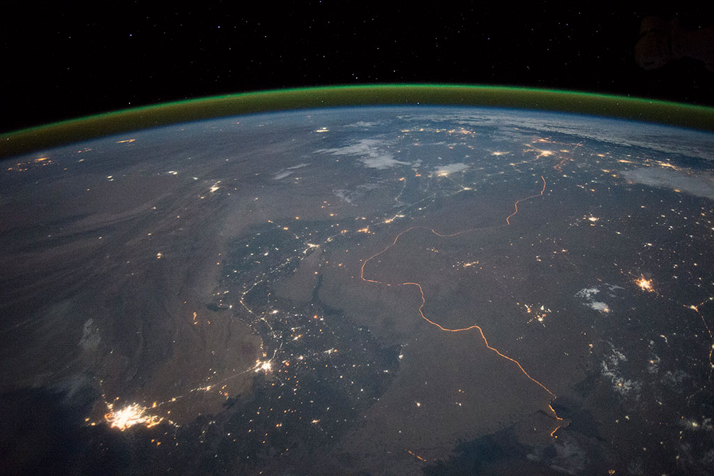 The Pakistan-India (right) border is one of the few international boundaries evident at night because of illumination from bright security lights. (Credit: NASA)