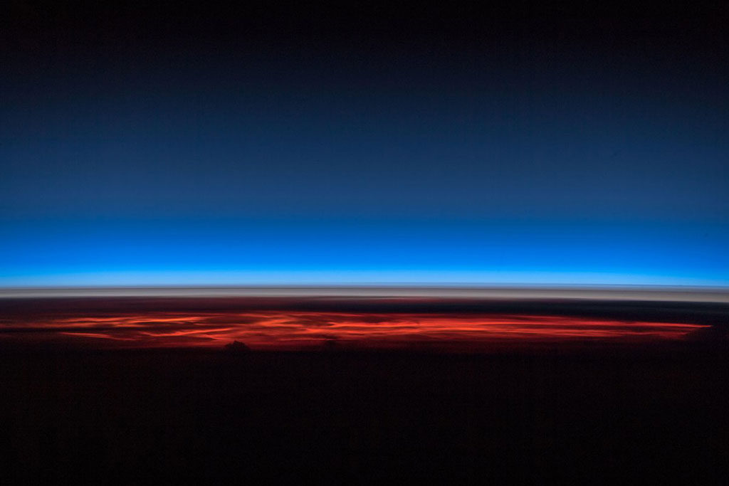 Shared on Twitter by @Astro_Alex: “A few seconds before sunrise we get a really good sideways view through the atmosphere. You can see some thunderstorm clouds – and not much above them...” (Credit: Alexander Gerst/European Space Agency)