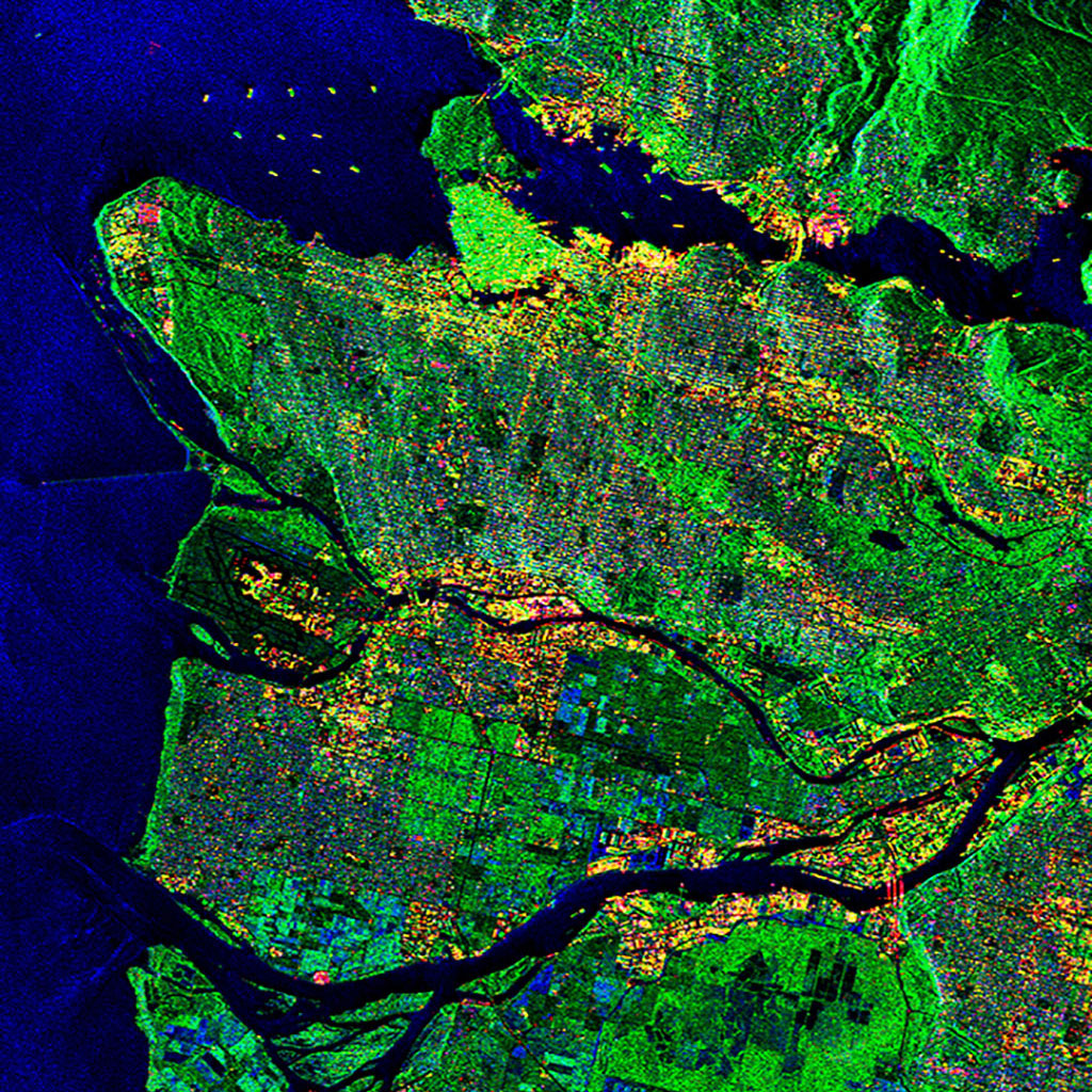 Ships can clearly be seen in this image of Vancouver (top, left) acquired by Canada's RADARSAT-2 satellite. (Credit: RADARSAT-2 Data and Products © MacDonald Dettwiler and Associates Ltd (2011) – All Rights Reserved – RADARSAT is an official mark of the Canadian Space Agency)