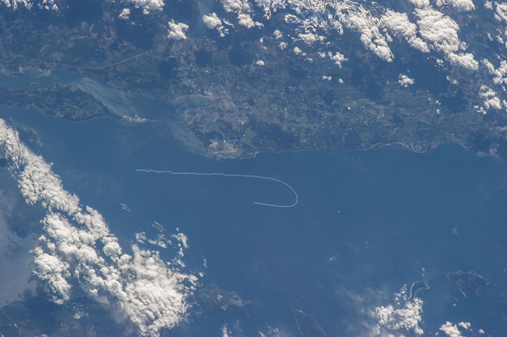Former Canadian Space Agency astronaut Chris Hadfield took this photo of the contrail of the Snowbirds flying in formation near Comox, British Columbia, during his last mission aboard the International Space Station in 2013. (Credit: Chris Hadfield/Canadian Space Agency)