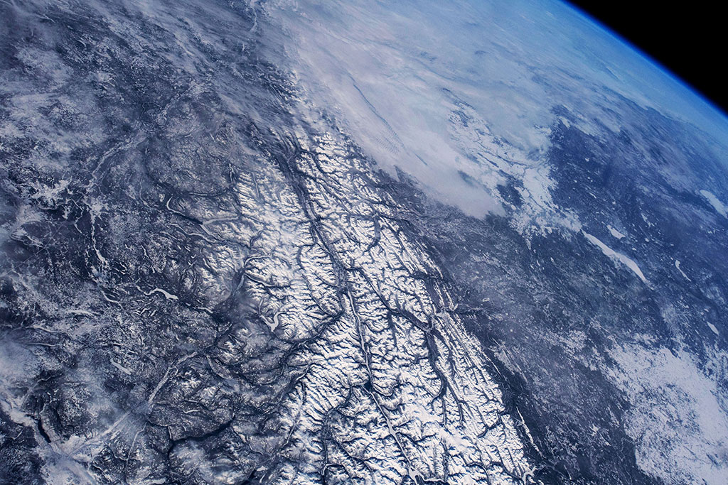 The Rocky Mountain Trench, also known as The Valley of a Thousand Peaks, is a large valley that extends approximately 1,600 km from Montana to just south of the British Columbia-Yukon border. This picture of the southern part of the trench was taken by David Saint-Jacques aboard the International Space Station. (Credit: Canadian Space Agency/NASA)