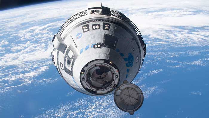 The CST-100 Starliner spacecraft in space over the South Pacific