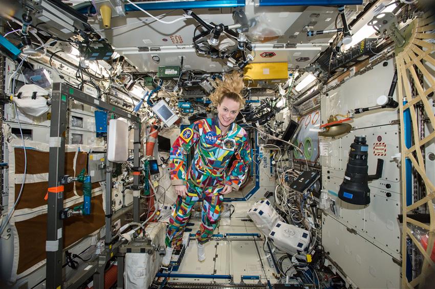 Kate Rubins wearing hand-painted space suit