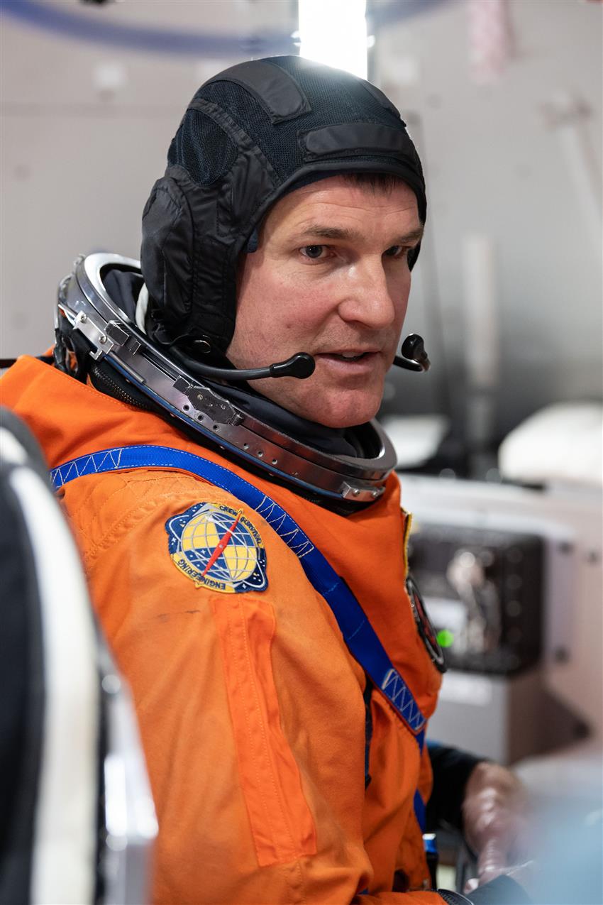 Close-up of Jeremy in a spacesuit. 