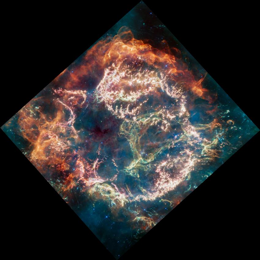 Colourful image of a supernova remnant, as seen in a diamond shape on a black background